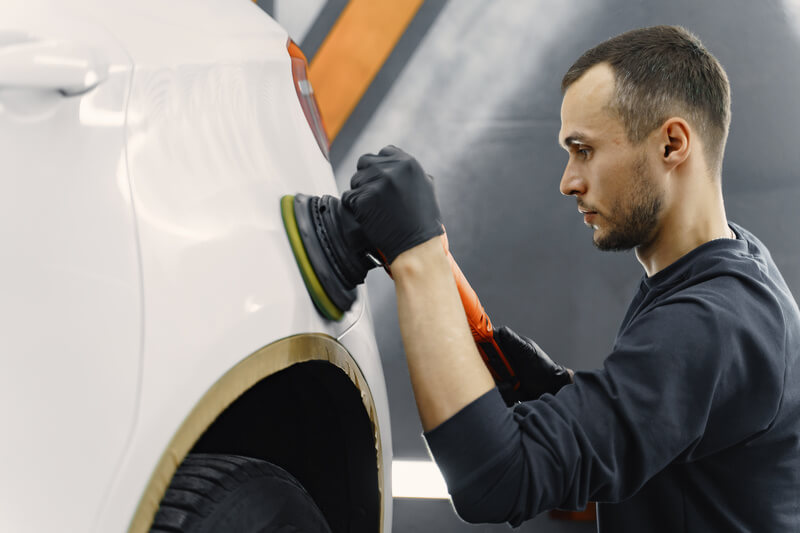 Buffing a car to repair clear coat scratches