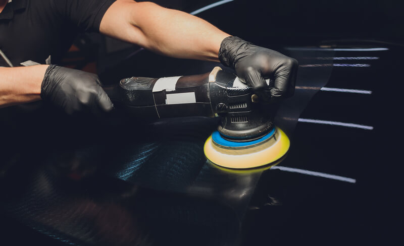 repairing car paint scratches with orbital polisher