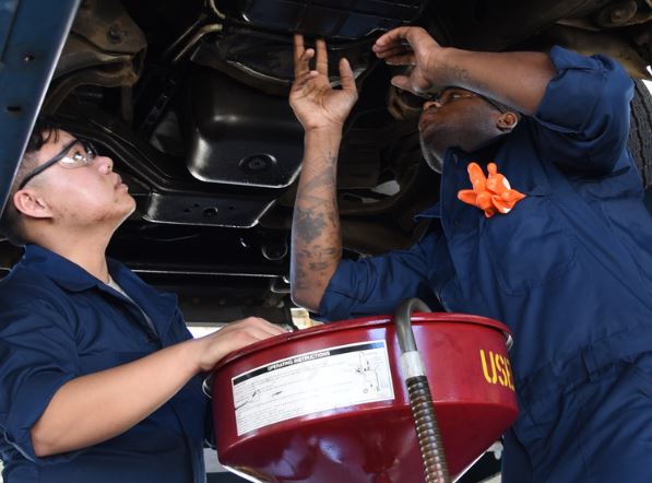 mechanics under car