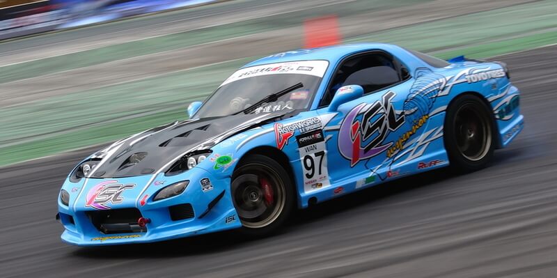 Blue Mazda RX-7 FD drifting