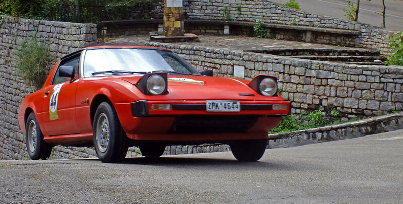 Red Mazda RX-7 FB first generation