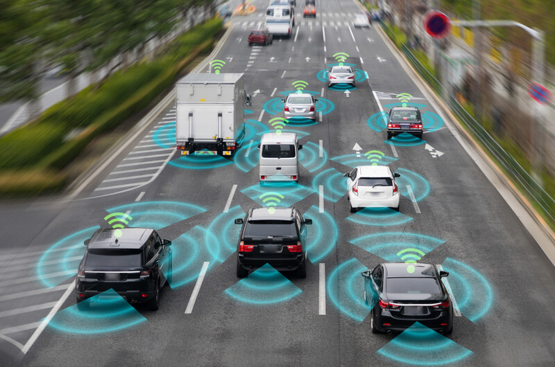 Cars using adaptative cruise control in traffic