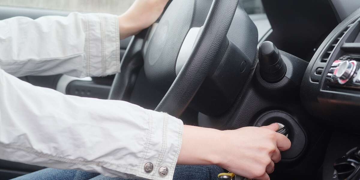 Women Starting a car
