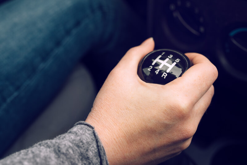 Man push-starting a car