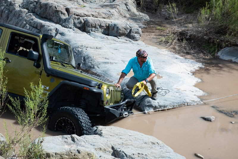 Green Jeep in the mud