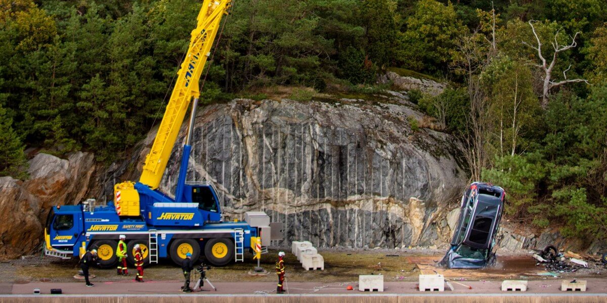 Volvo drops new cars from 30 metres crane
