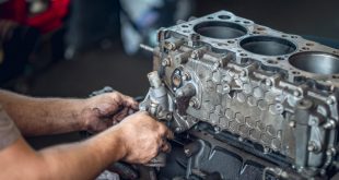 Mechanic repairing a diesel engine
