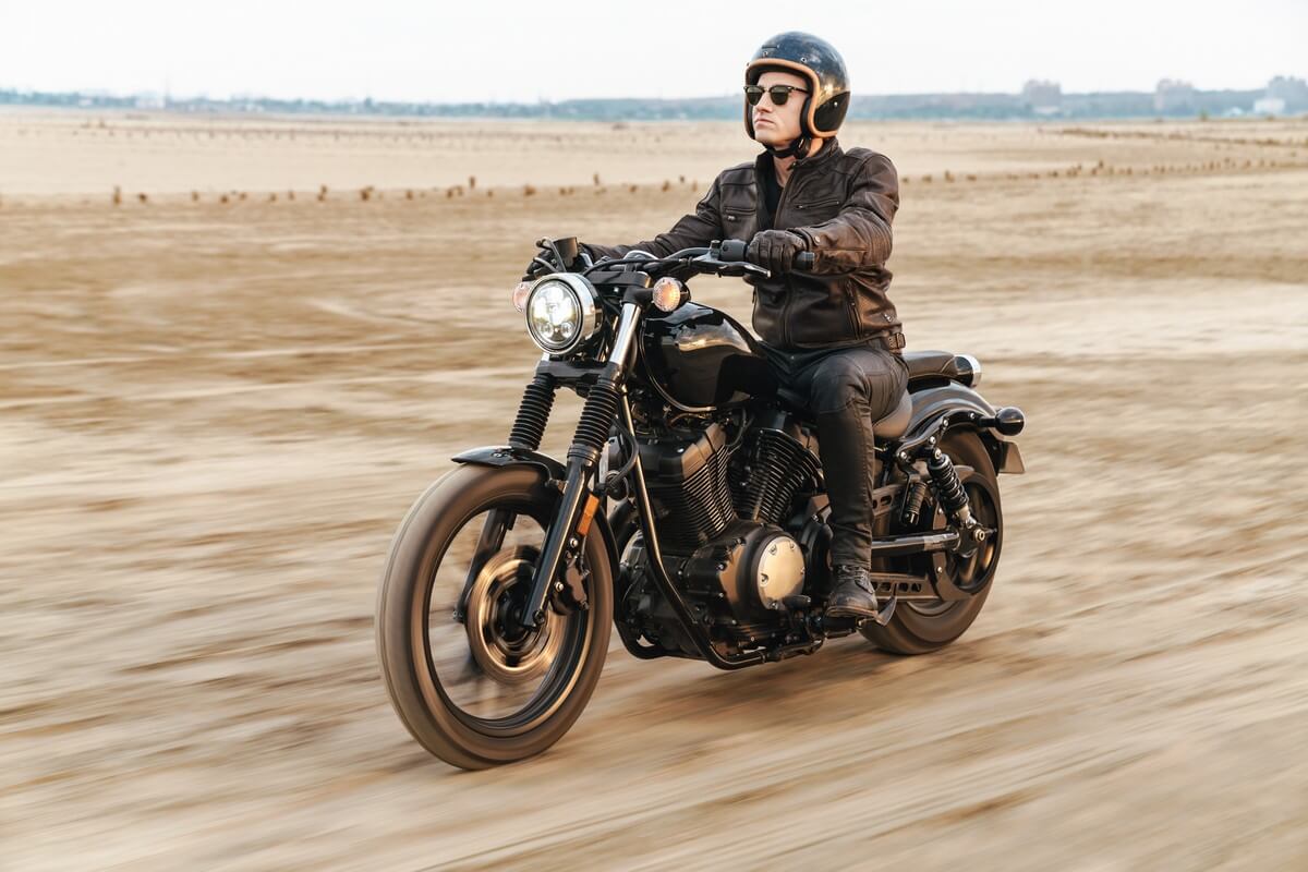 motorcycle riding on sand