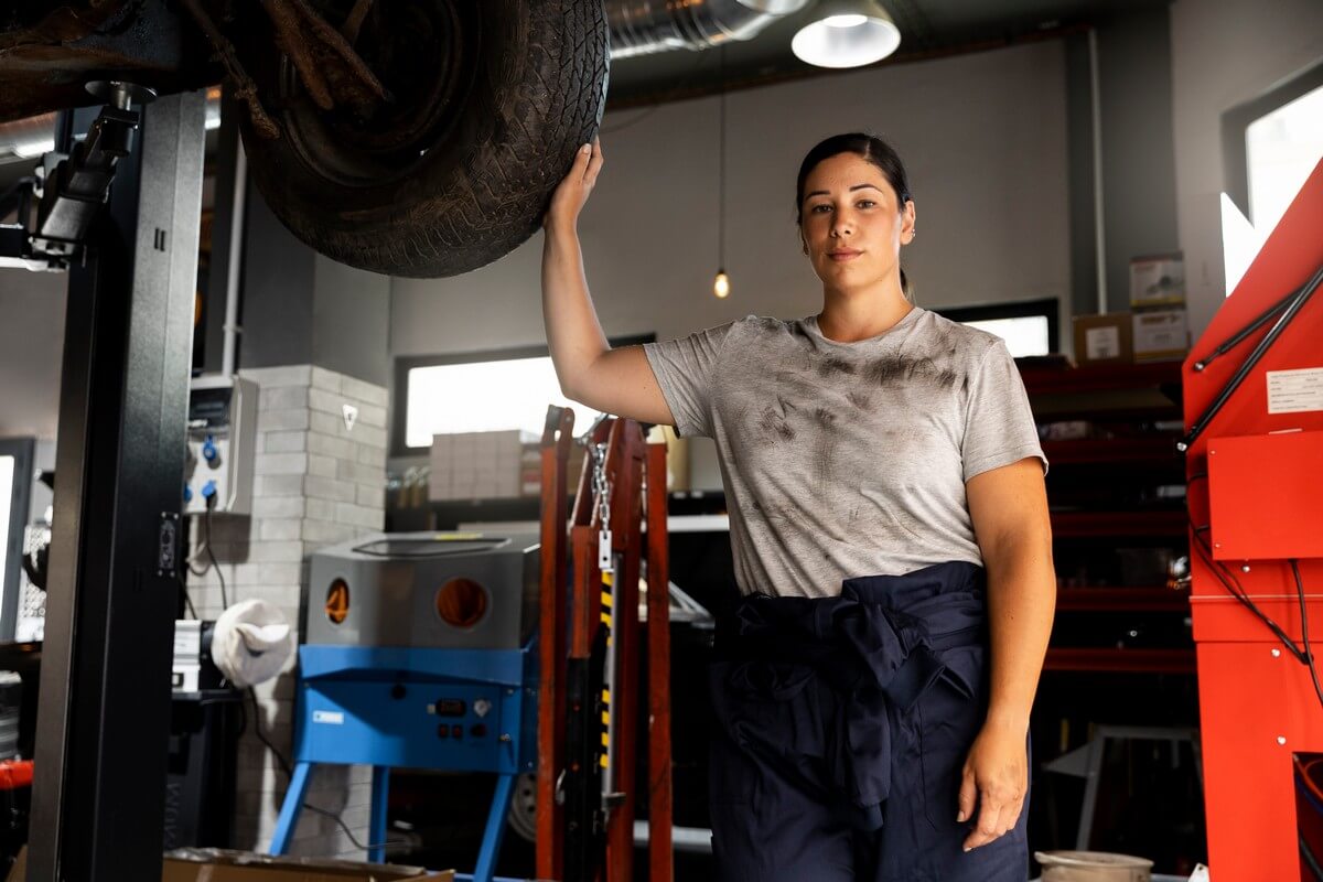 Young female auto mechanic